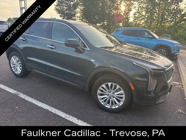 2024 Cadillac XT4 Luxury in Emerald Lake Metallic — front three-quarter view