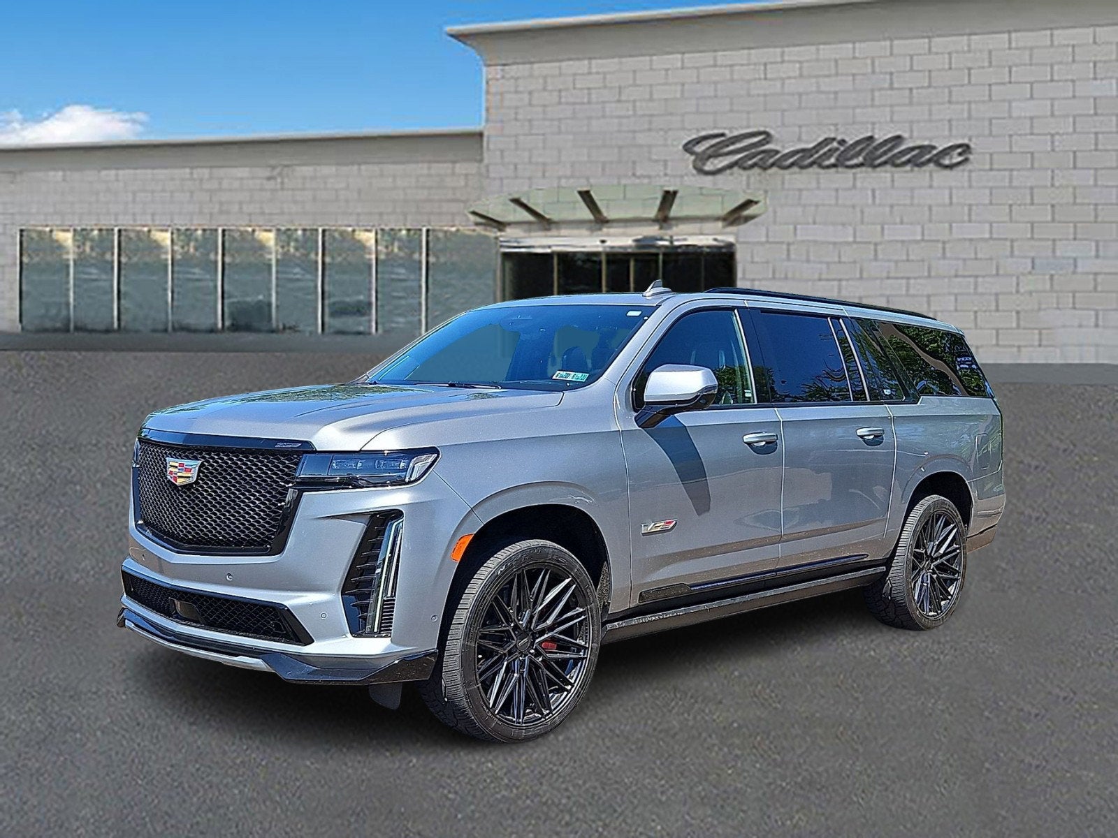 2024 Cadillac Escalade ESV V-Series in Argent Silver Metallic — front three-quarter view