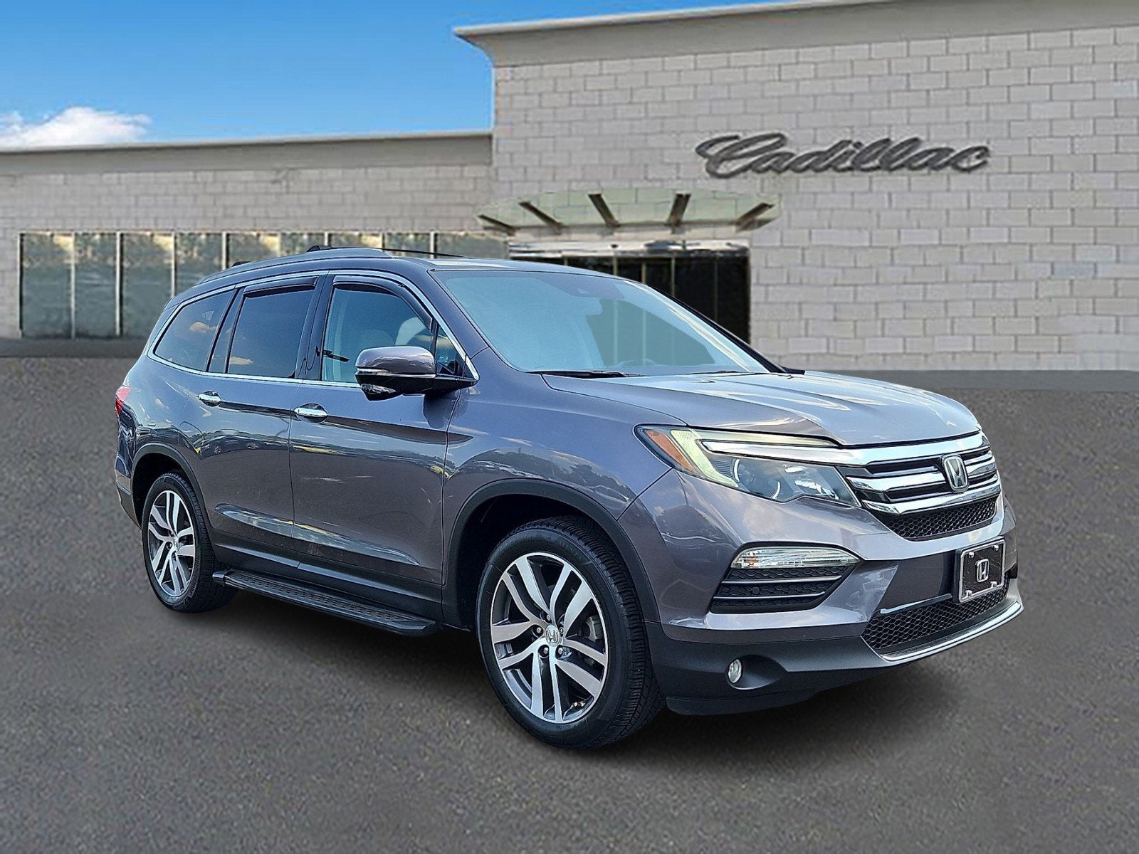 2018 Honda Pilot — rear three-quarter view