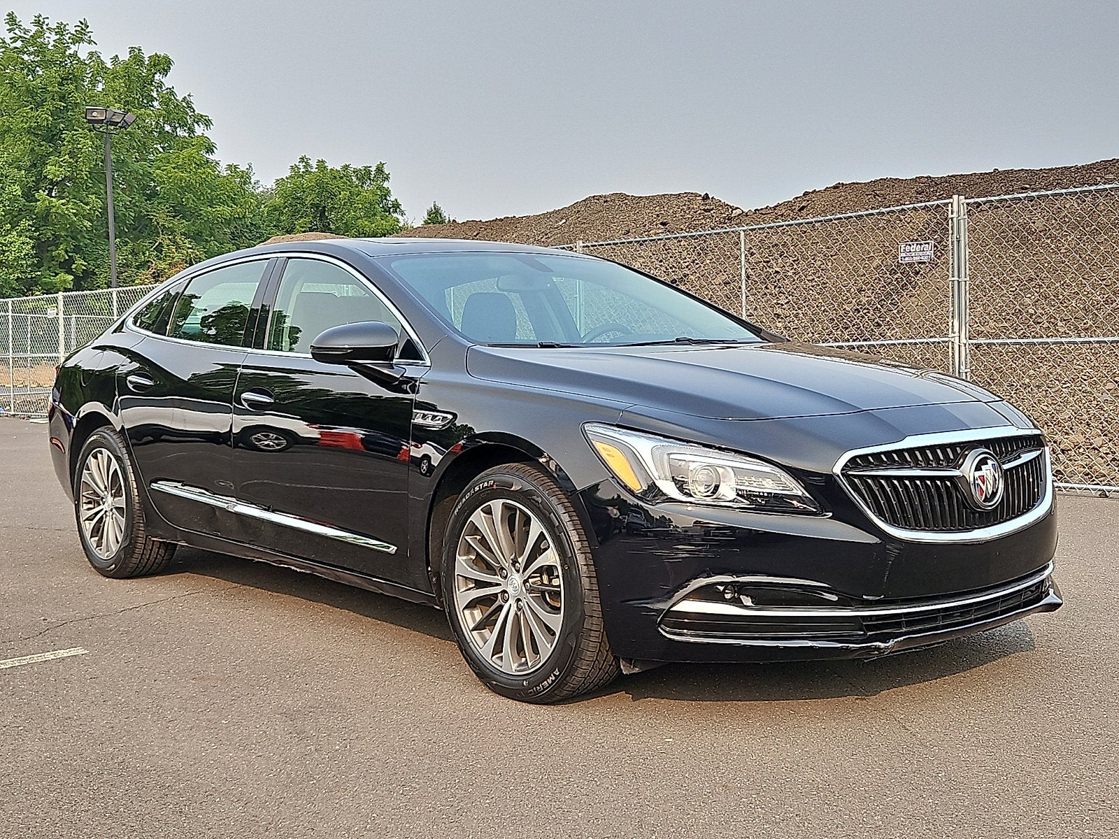 2017 Buick LaCrosse Essence in Black Oynx — front three-quarter view