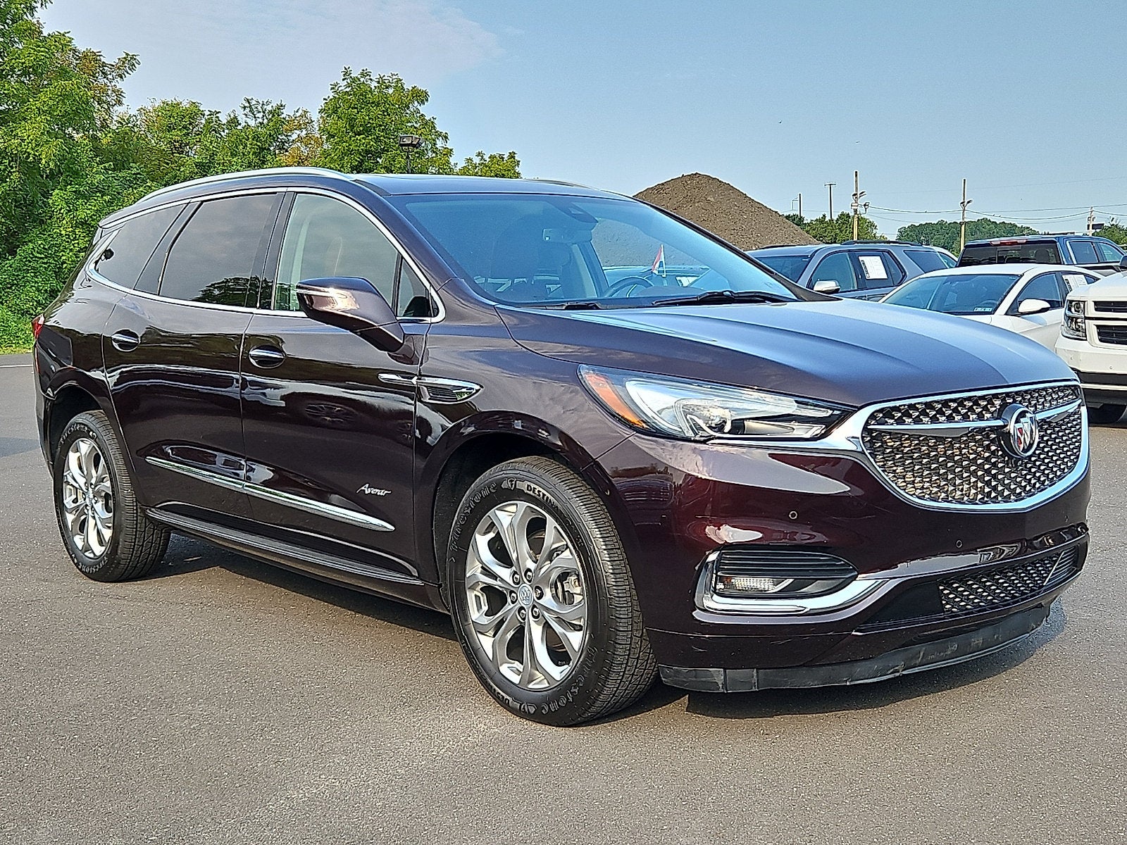 2021 Buick Enclave Avenir in Rich Garnet Metallic — front three-quarter view