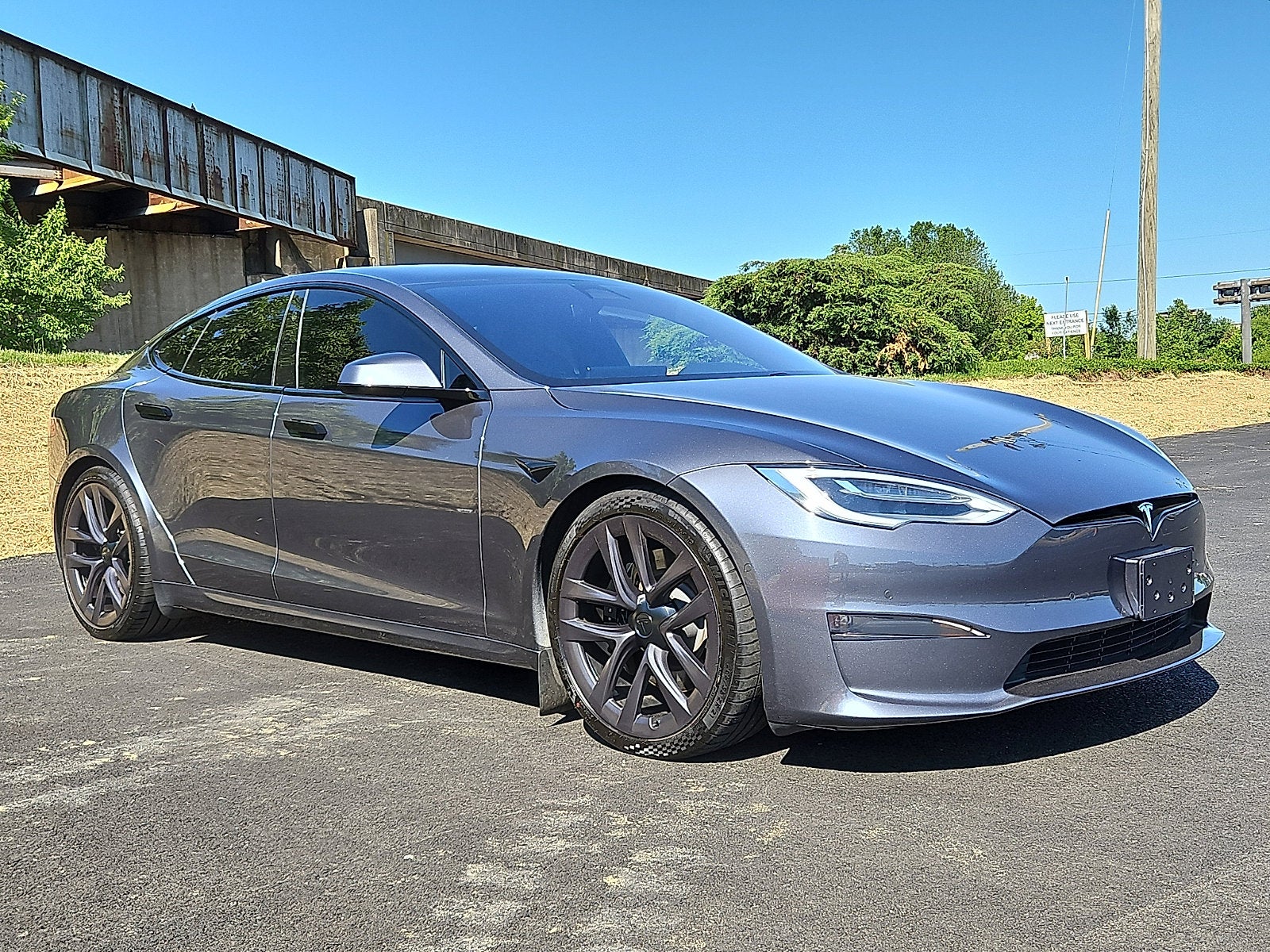 2021 Tesla Model S Plaid in Midnight Silver Metallic — front three-quarter view