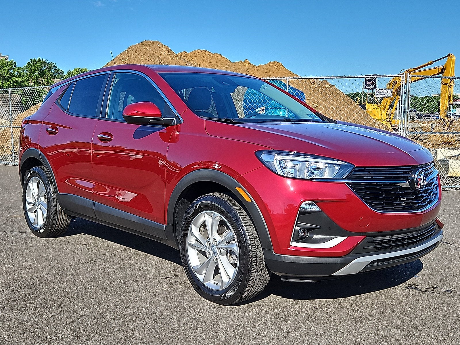 2023 Buick Encore GX Preferred in Cinnabar Metallic — front three-quarter view