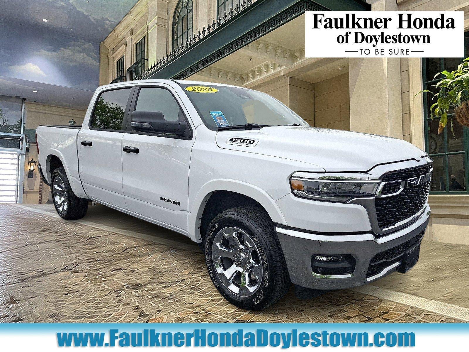 2026 RAM 1500 Big Horn 4x4 Crew Cab 5'7" Box in Bright White Clearcoat — front three-quarter view