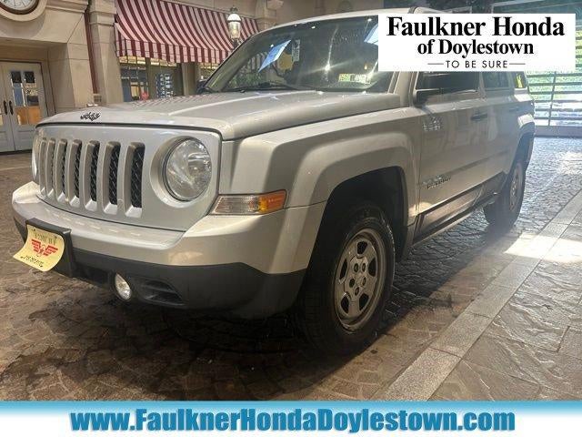 2011 Jeep Patriot 4WD 4dr Sport in Bright Silver Metallic — front three-quarter view