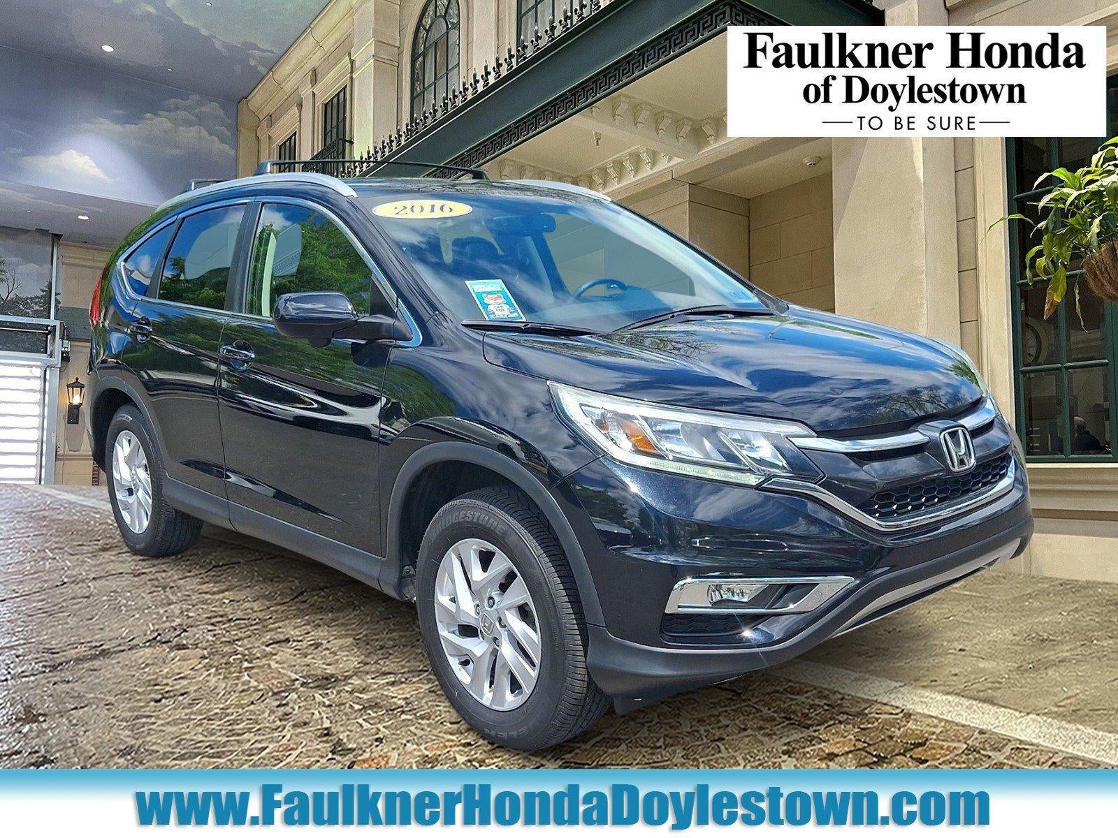 2016 Honda CR-V EX-L AWD in Crystal Black Pearl — front three-quarter view
