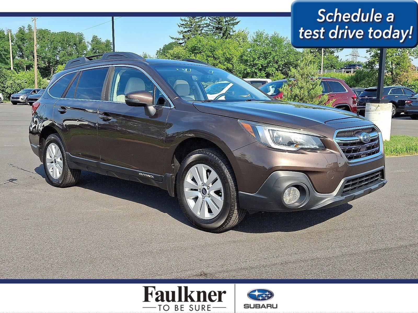 2019 Subaru Outback 2.5i Premium in Cinnamon Brown Pearl — front three-quarter view