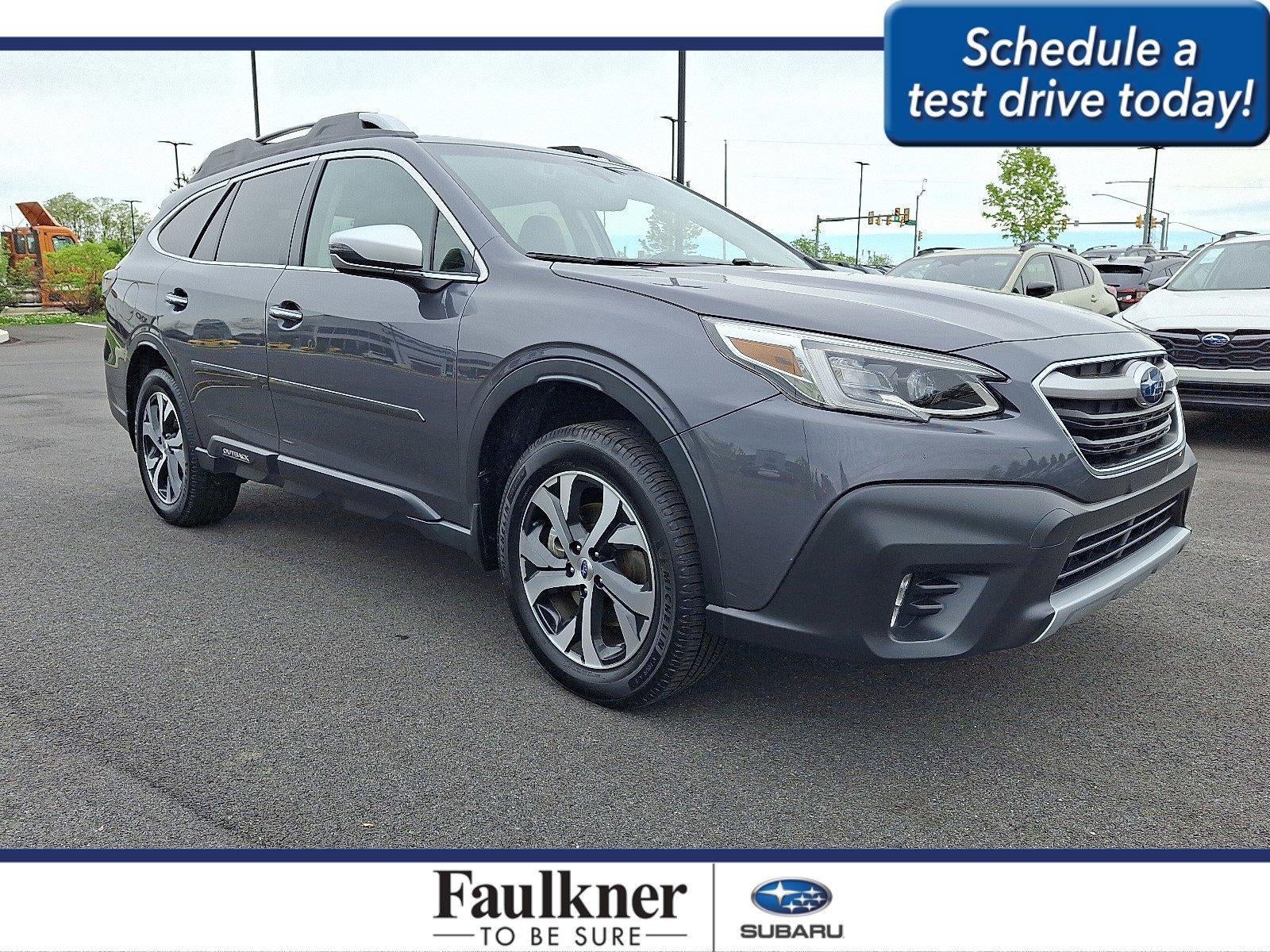 2021 Subaru Outback Touring CVT in Magnetite Gray Metallic — front three-quarter view