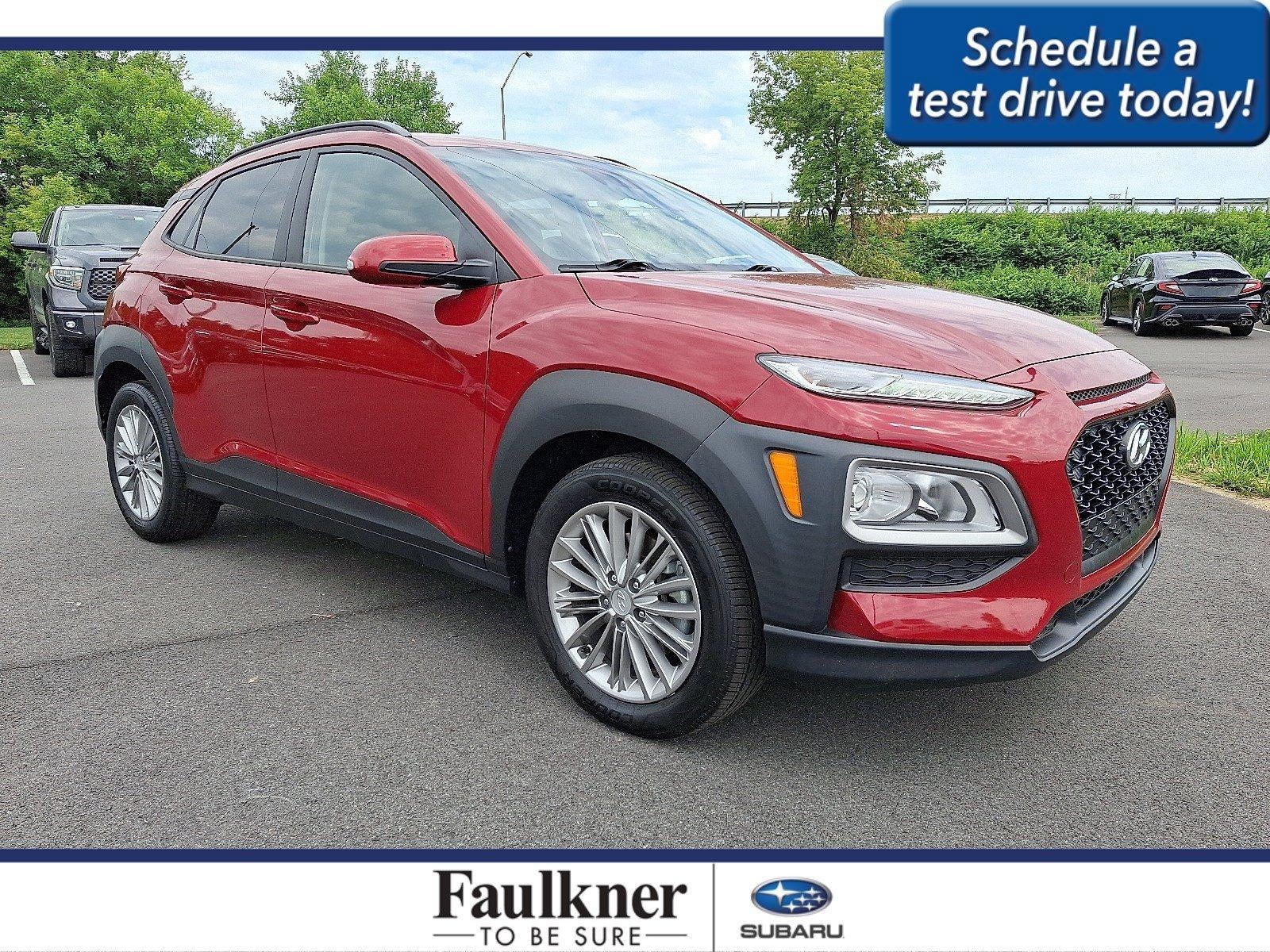 2020 Hyundai KONA SEL Auto AWD in Pulse Red — front three-quarter view