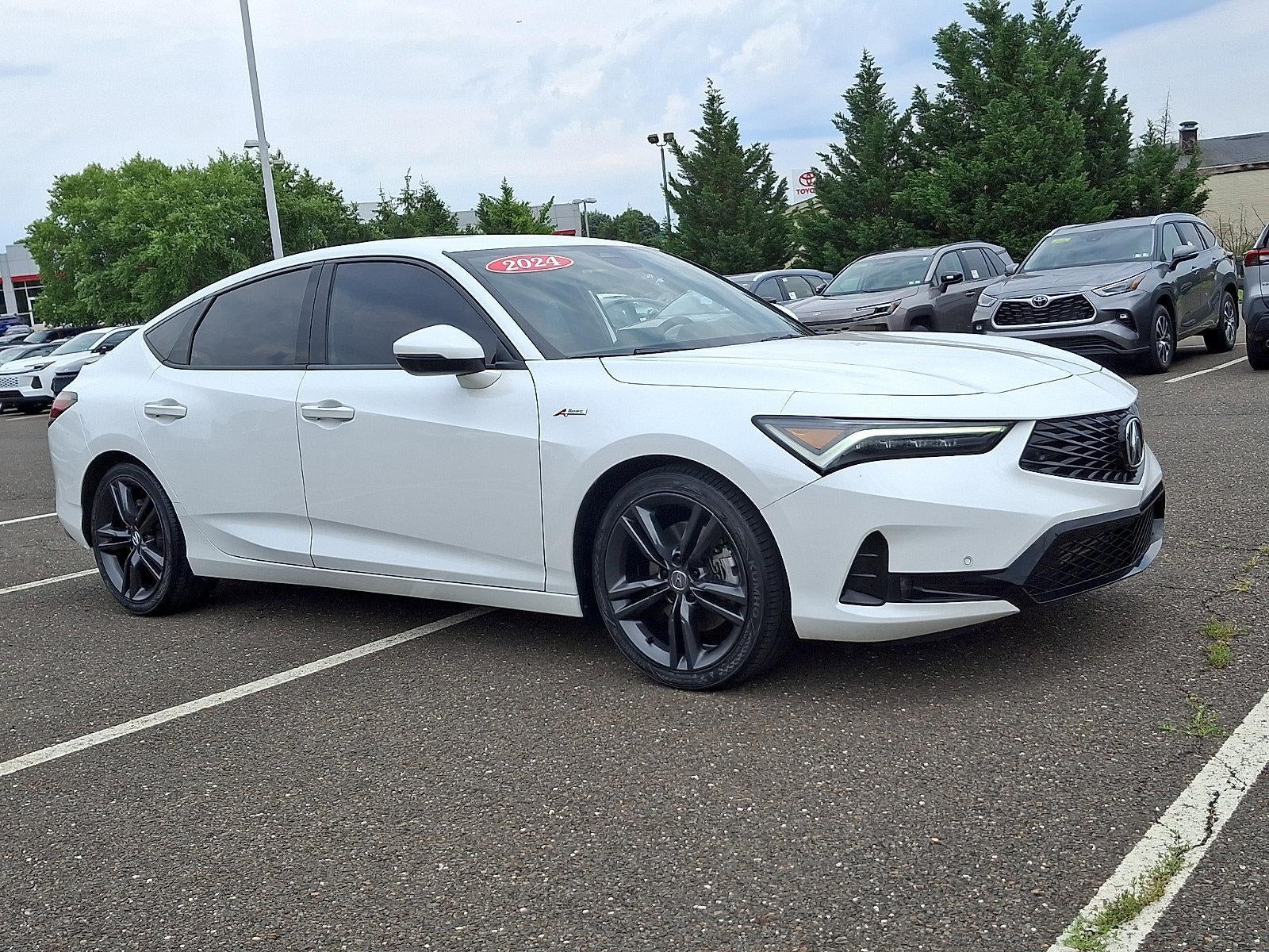 2024 Acura Integra CVT w/A-Spec Technology Package in Platinum White Pearl White — front three-quarter view