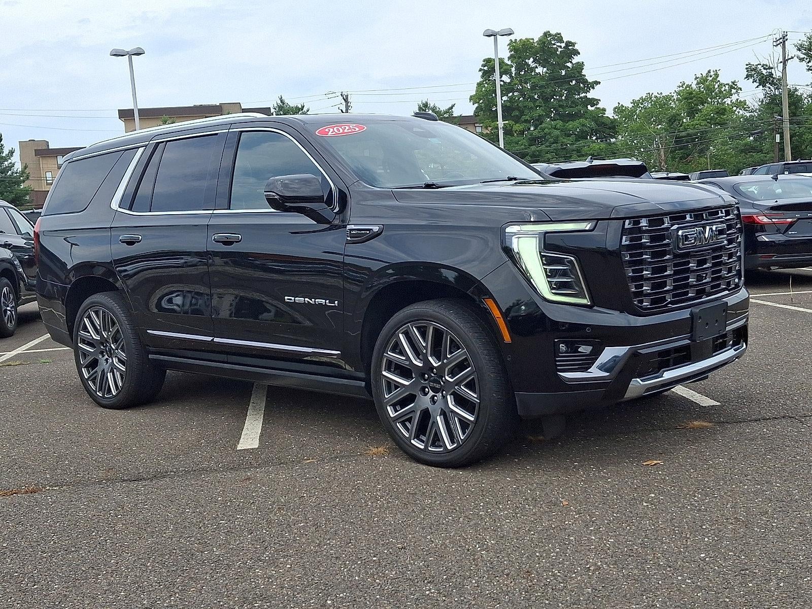 2025 GMC Yukon 4WD 4dr Denali Ultimate in Onyx Black — front three-quarter view