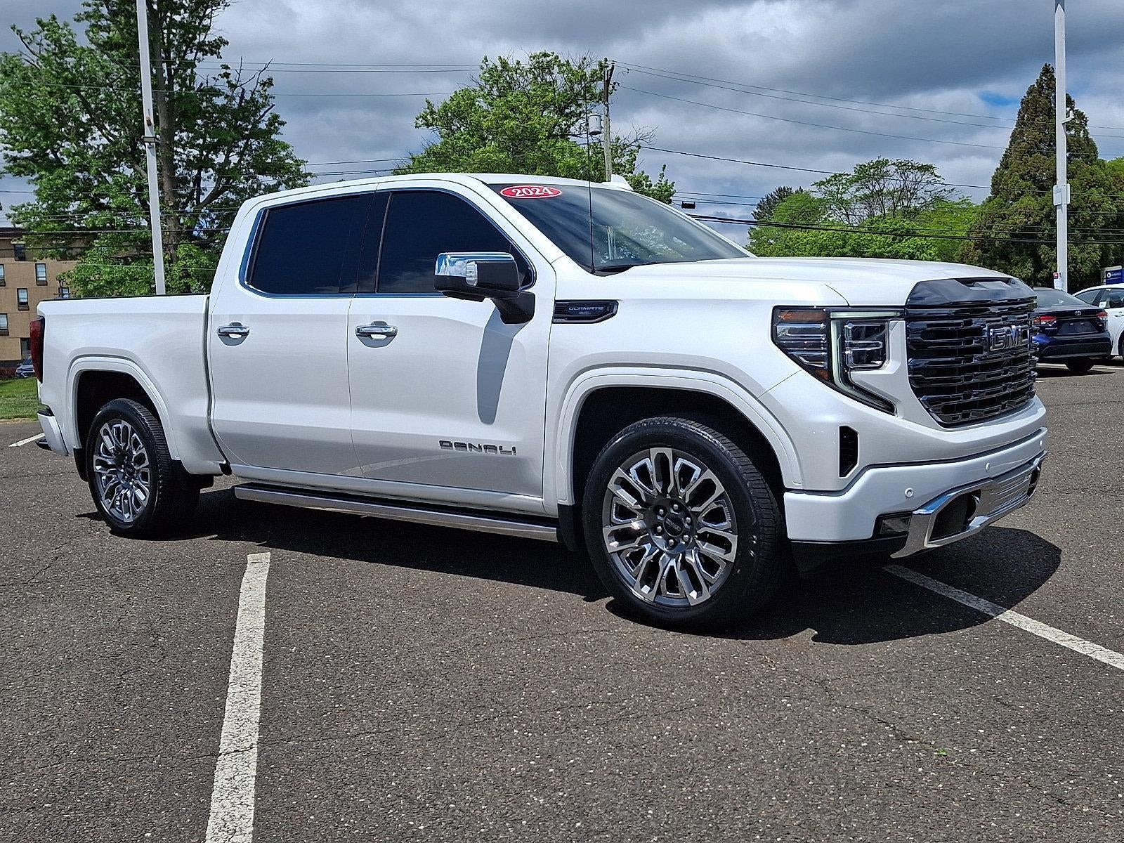 2024 GMC Sierra 1500 Crew Cab Short Box 4-Wheel Drive Denali Ultimate in White Frost Tricoat — front three-quarter view