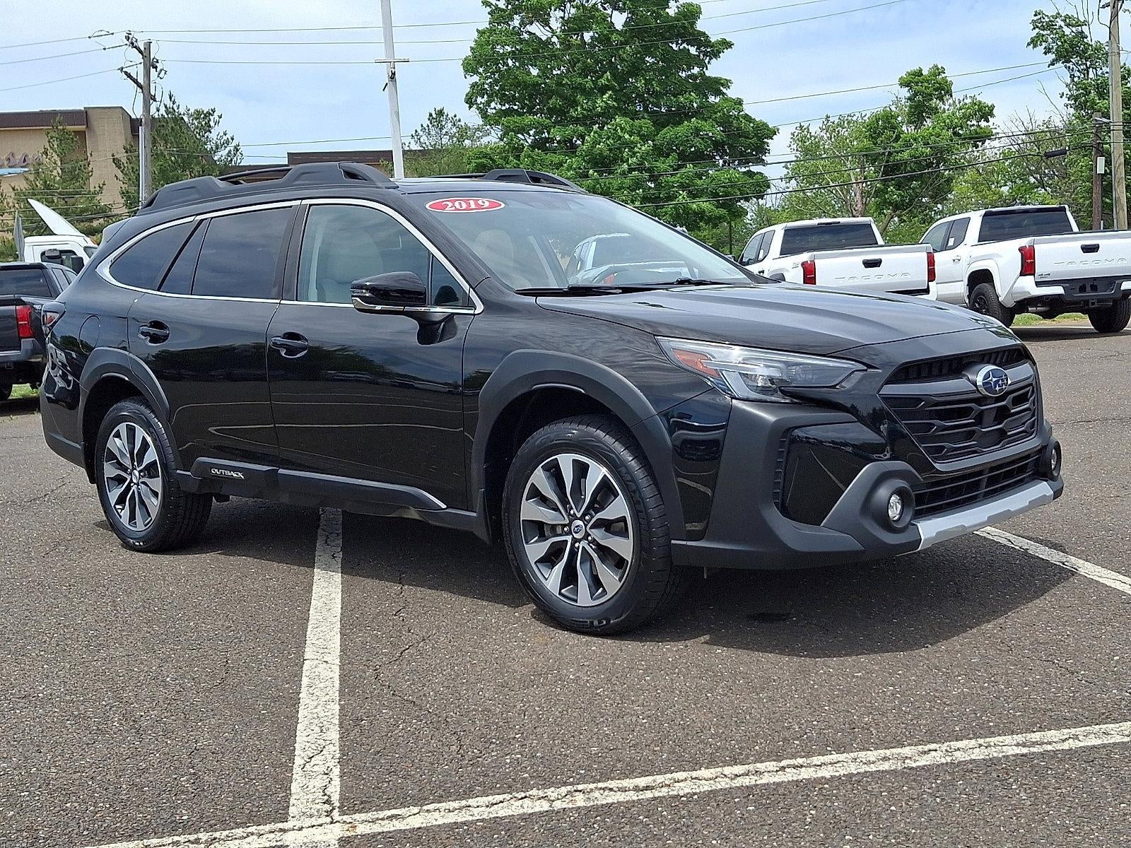 2023 Subaru Outback Limited CVT in Crystal Black Silica — front three-quarter view