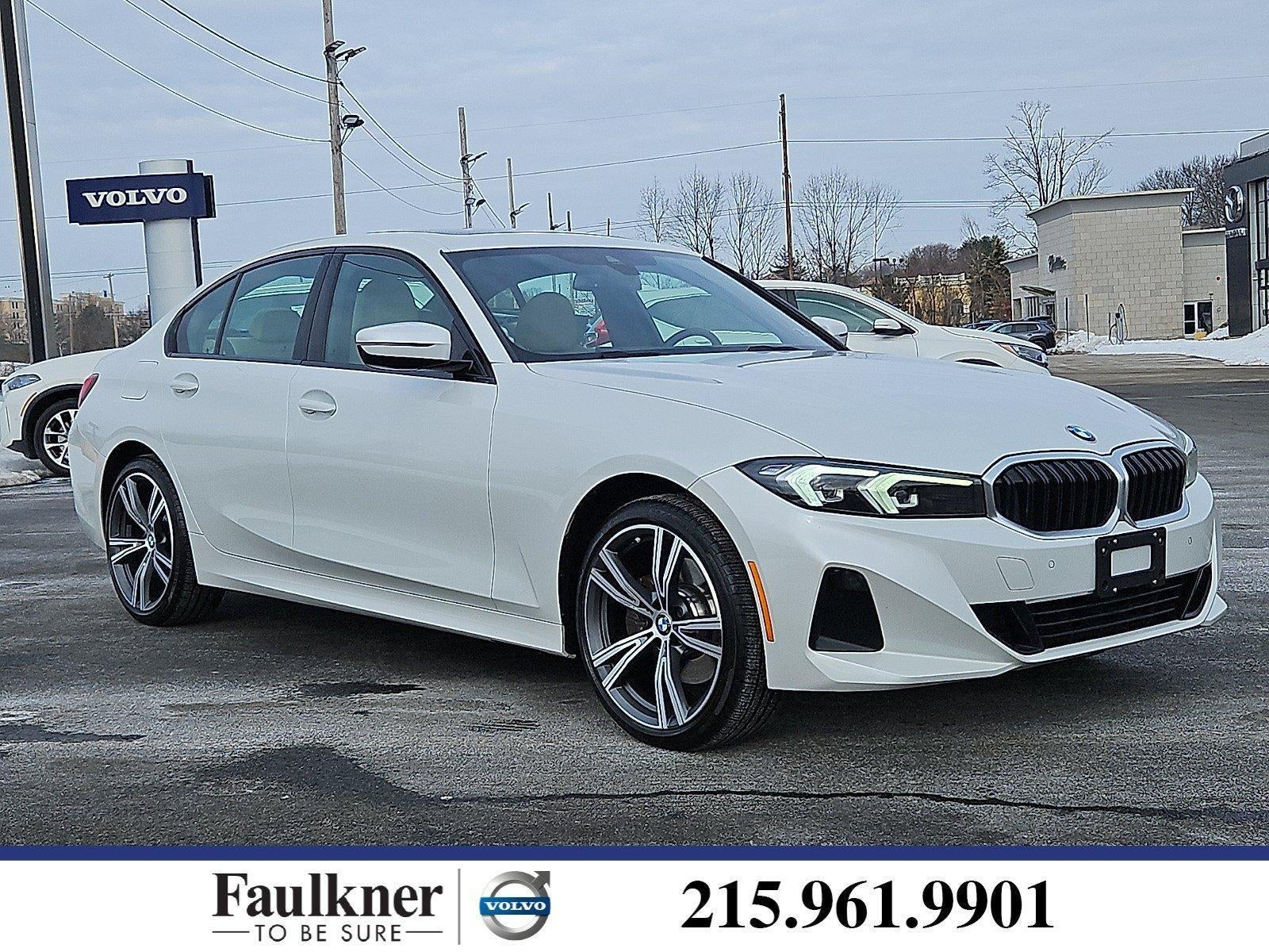 2023 BMW 330i xDrive Sedan in Mineral White Metallic — front three-quarter view