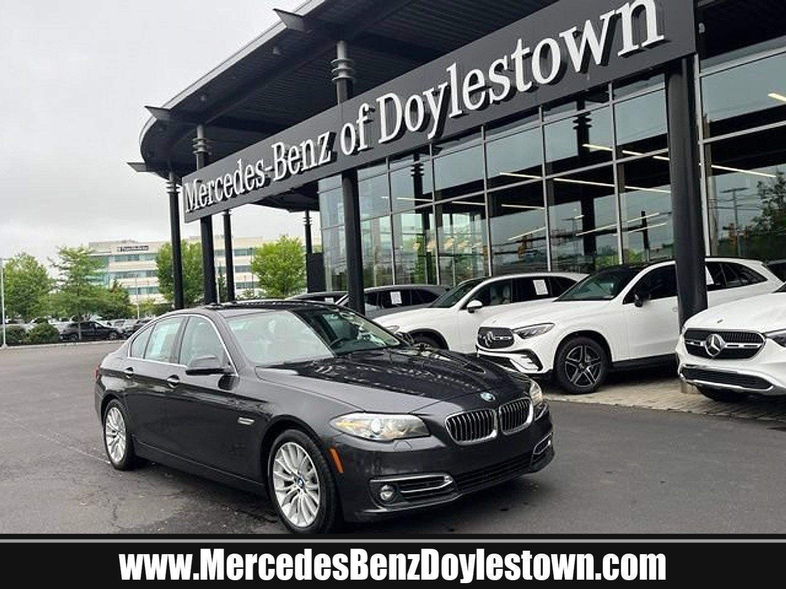2015 BMW 528i xDrive Sedan in Space Gray Metallic — front three-quarter view