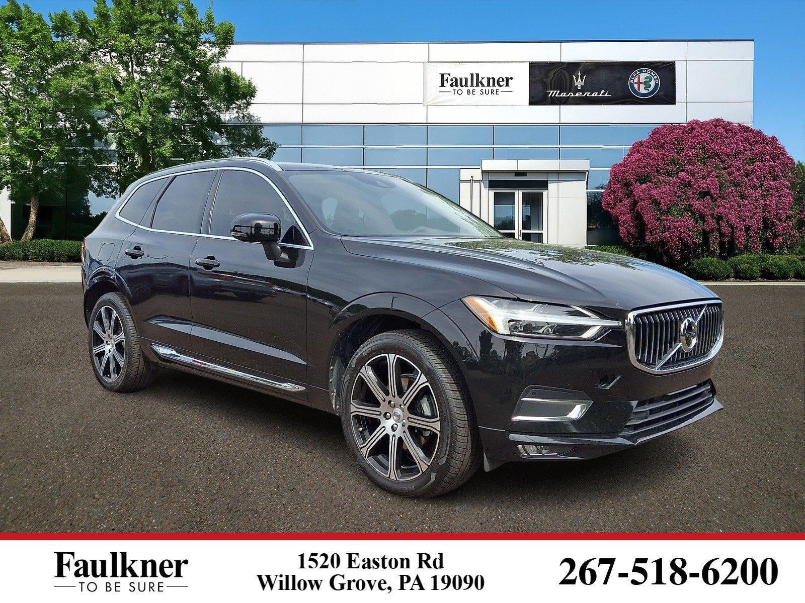 2020 Volvo XC60 T5 AWD Inscription in Onyx Black Metallic — front three-quarter view