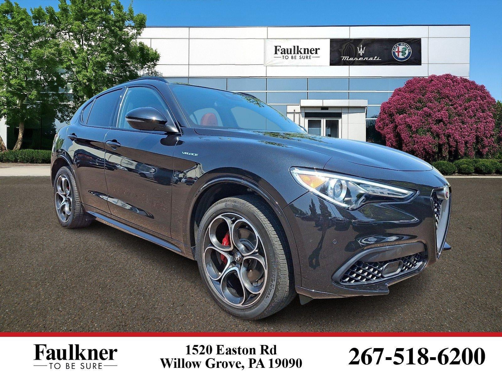 2023 Alfa Romeo Stelvio Veloce AWD in Vulcano Black Metallic — front three-quarter view