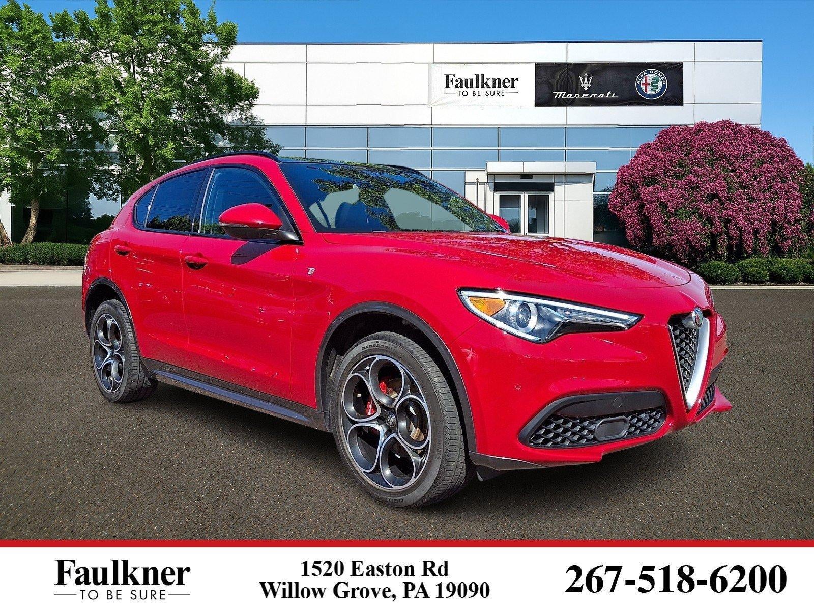 2023 Alfa Romeo Stelvio Ti AWD in Alfa Rosso — front three-quarter view