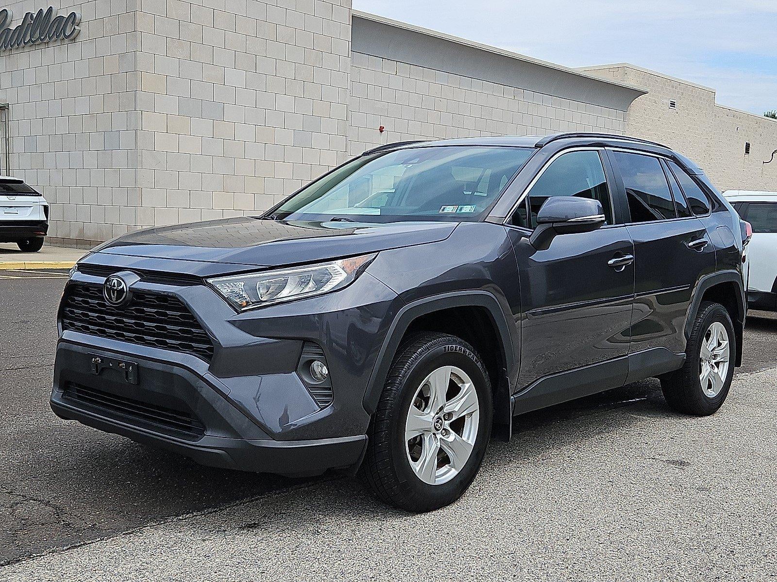 2021 Toyota RAV4 XLE AWD (Natl) in Magnetic Gray Metallic — front three-quarter view