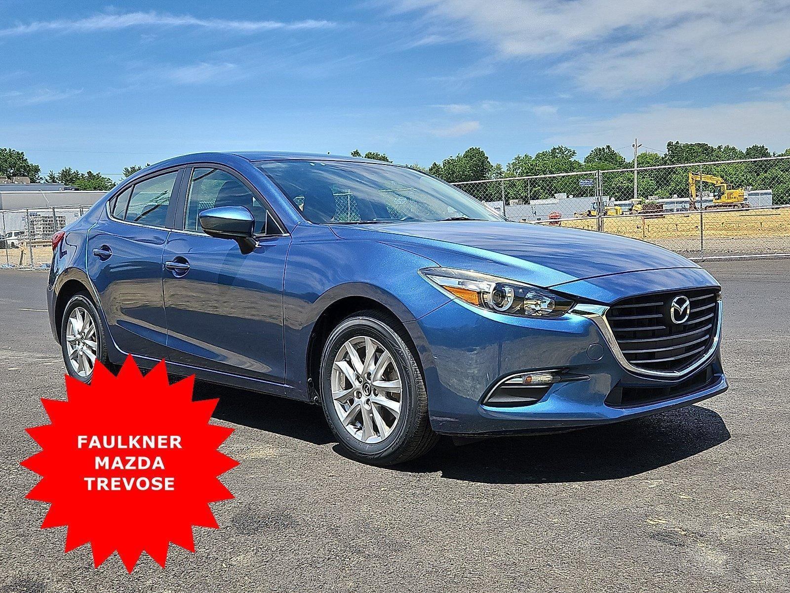 2017 Mazda Mazda3 4-Door Sport Auto in Eternal Blue Mica — front three-quarter view