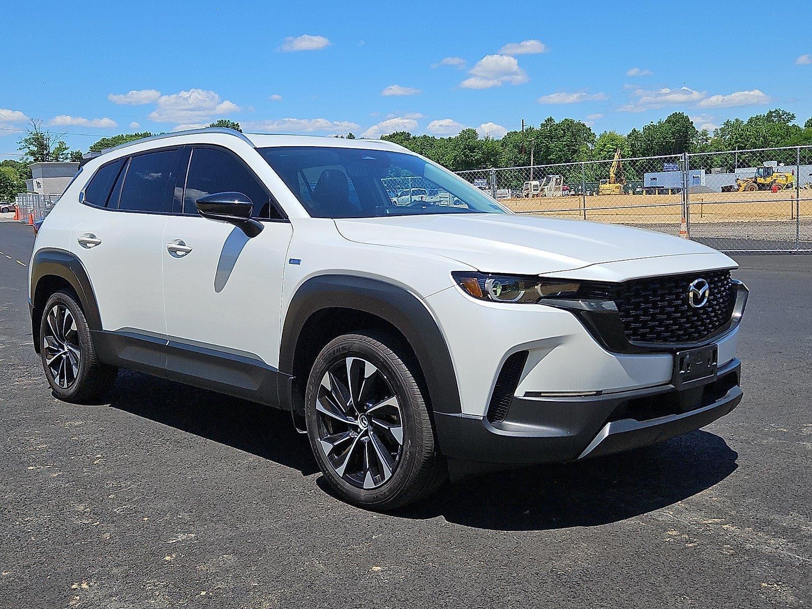 2025 Mazda Mazda CX-50 Hybrid Premium Plus Package AWD in Wind Chill Pearl — front three-quarter view