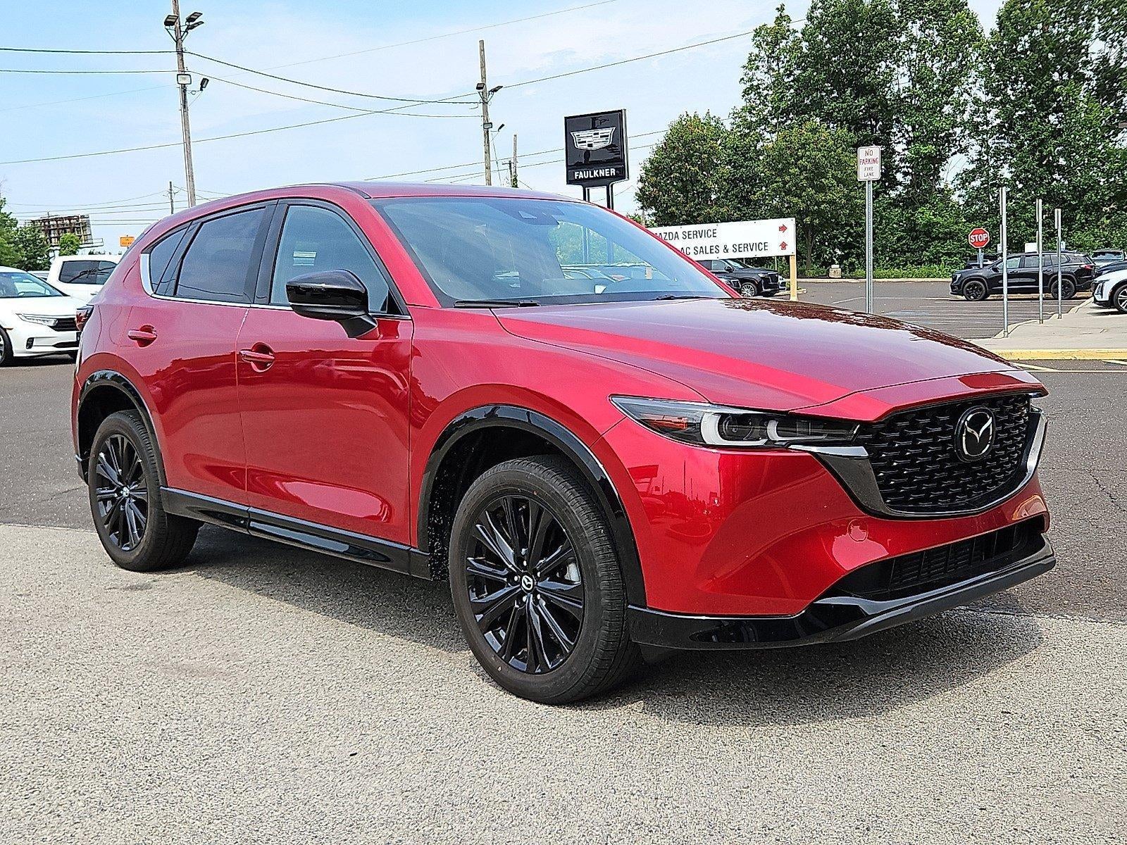 2023 Mazda Mazda CX-5 2.5 Turbo AWD in Soul Red Crystal Metallic — front three-quarter view
