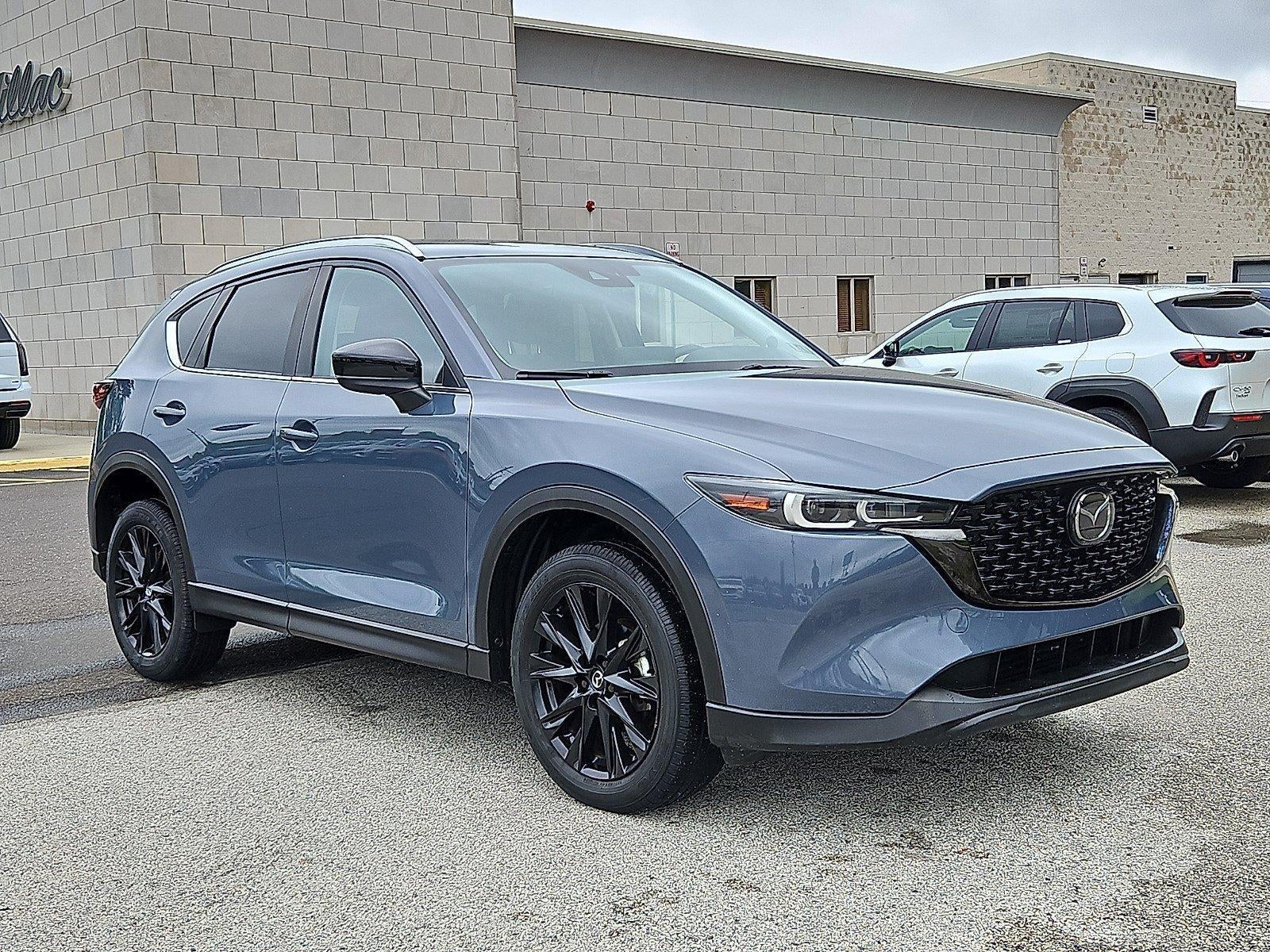 2023 Mazda Mazda CX-5 2.5 S Carbon Edition AWD in Polymetal Gray — front three-quarter view