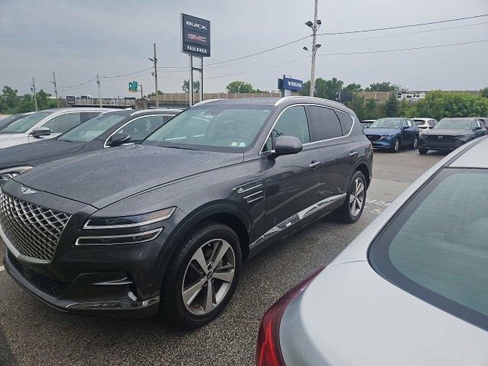 2021 Genesis GV80 2.5T AWD in Himalayan Gray — front three-quarter view